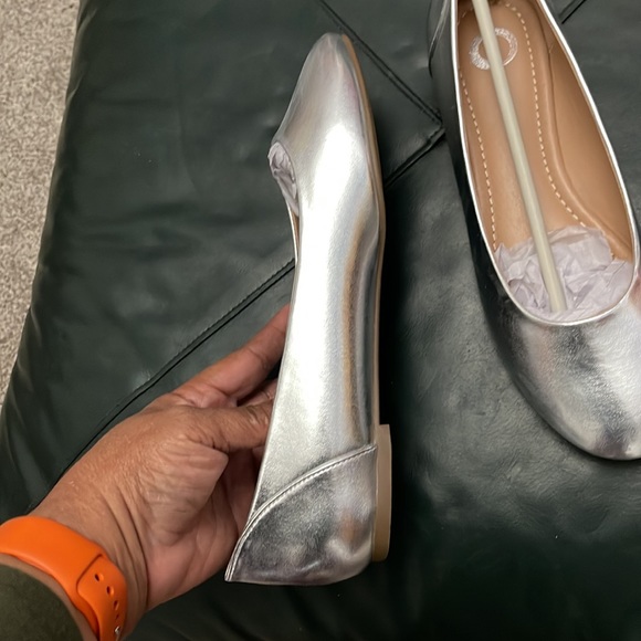 Silver flats never worn. Ordered & arrived from retailer w/o a box as pictured. - Picture 6 of 11